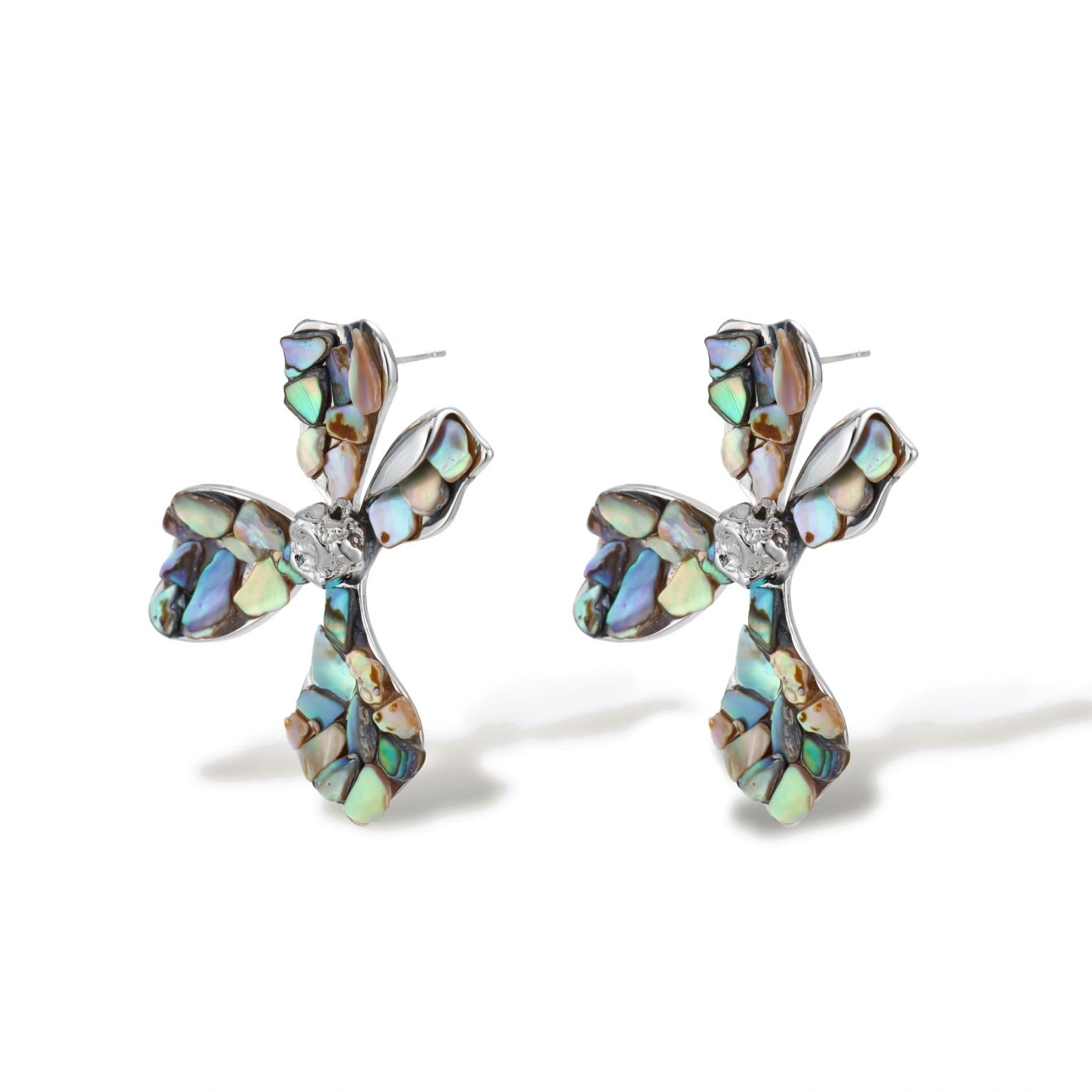 Cross-shaped stud earrings with iridescent abalone shell mosaic in blues and greens, silver-plated setting with crystal center