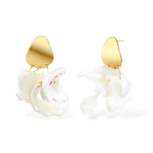 Gold-plated copper earrings with organic pebble studs and natural shell drops on cream background.